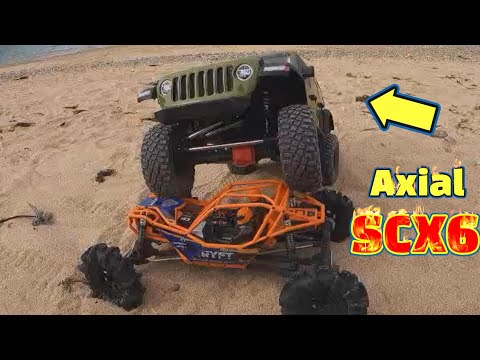 Big axial SCX6 climbs a steep slope
