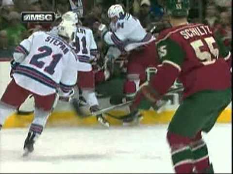 Derek Boogaard flattens Robbie Earl and Artem Anisimov Scores