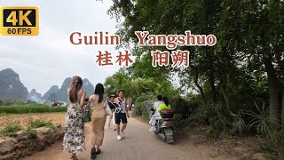 Beautiful Guilin Yangshuo scenery ，sexy Asian woman Cycling in the beautiful scenery
