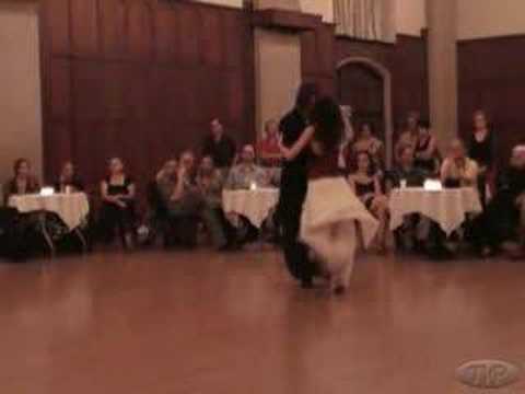  Luciana Valle  and  Jaimes Friedgen  are  dancing  to  a  tango