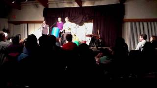 Billy Jonas performs "Eyes Wide Open" at the One World Coffeehouse