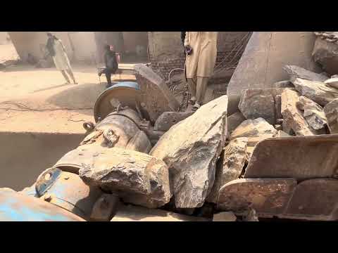 "Stone Crusher Machine: A Giant at Work"The Power of Stone: Machine Working in Action"#stonecrusher