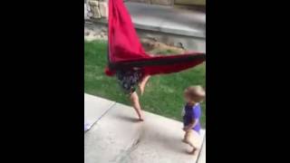 3 year old teaches her baby sister how to get in hammock