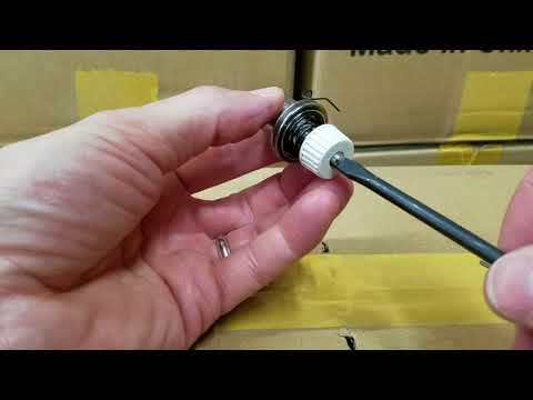Single needle tension check spring adjustment