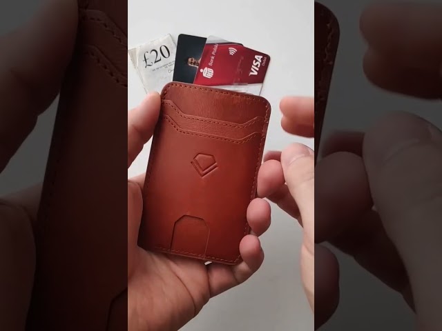 Vídeo relacionado con Valencia CF Monedero de Piel Genuina, Negro con Costuras Naranjas, Cartera con Cremallera. Producto Oficial