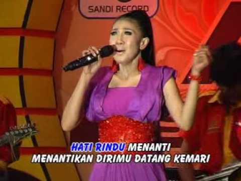 Erie Susan - Hujan ( Official Music Video )