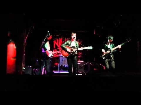 John McCullagh and The Escorts - Between the Lines