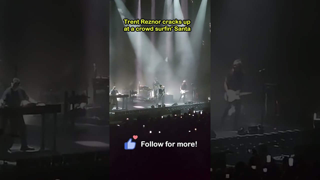 NIN frontman, Trent Reznor, cracks up after seeing a santa crowd surfing 😂 #nin #nineinchnails