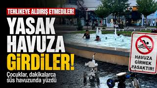  Bolu'da Tehlikeli Serinlik Yasağa ve Elektrik Akımına Aldırış Etmeden Süs Havuzunda Yüzdüler