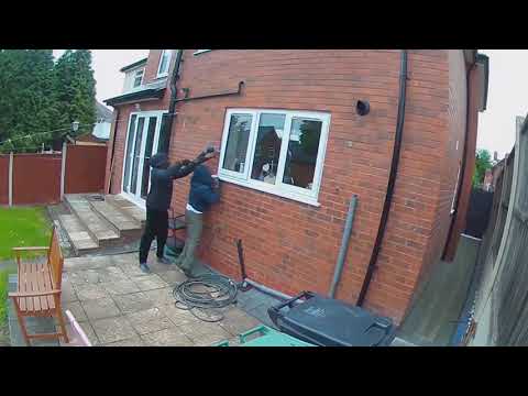 Burglars caught on CCTV breaking into a house in broad daylight