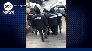Police raid Georgian opposition party offices and detain leader amid protests