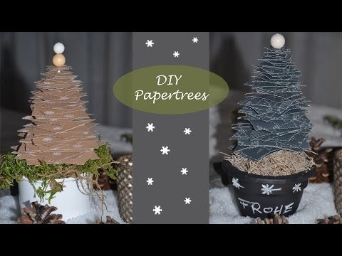 Kleine Tannenbäume aus Papier - Winterdeko leicht gemacht