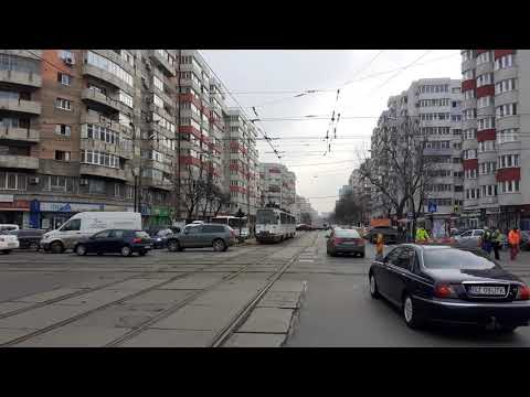The V3A M2000 #021 tram (24) & MBC E4 #4618 & #6266 buses (282 & 300) at Miciurin