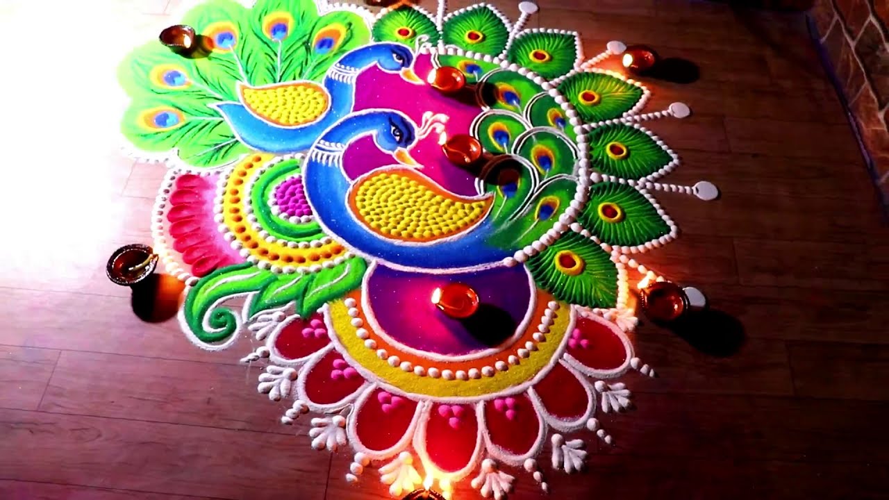 peacock rangoli design for festivals by jeet