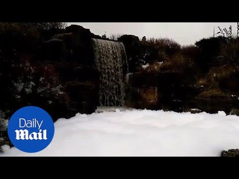 Pranksters transform fountain into GIANT bubble bath - Daily Mail