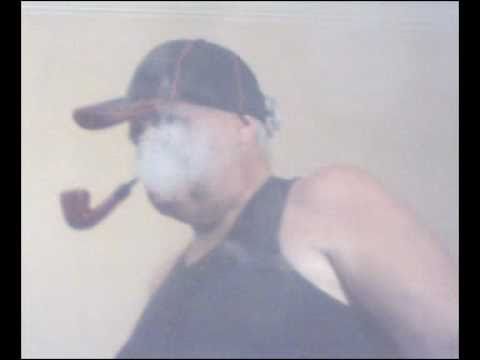 Smoking, Red Paronelli, Pipe, Curved, with Black T-Shirt of Surf; and Tango: " María ".