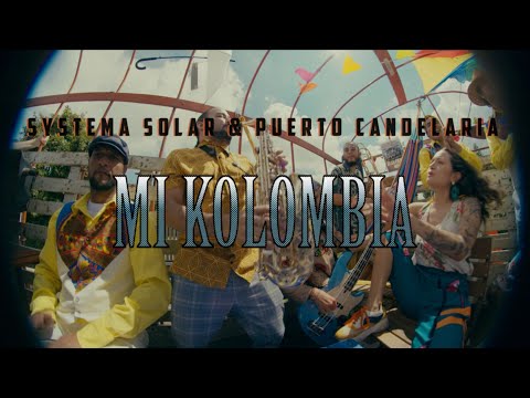 Systema Solar & Puerto Candelaria - Mi Kolombia (Video Oficial)