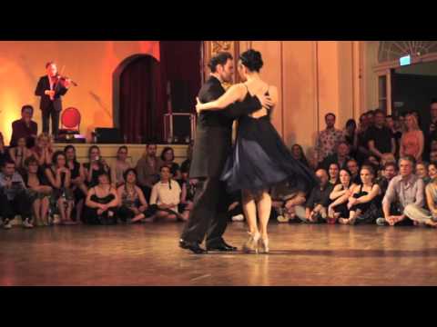  Joachim Dietiker  and  Michelle Marsidi  are  dancing  to  "  Buscandote  "  by  Solo Tango Orquesta  at  TangoFest Dresden  in  2016