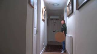 Long dark hallway transformed to brightness