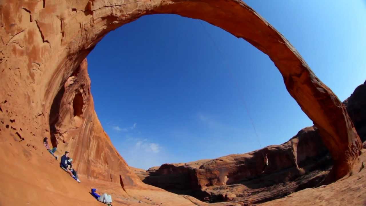 Watch People Fly From A Canyon Wall On A Gigantic Rope Swing
