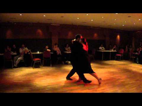  Ayelen Quiroga  and  Julian Vilardo  are  dancing  to  the  tango  "  Saludos  "
