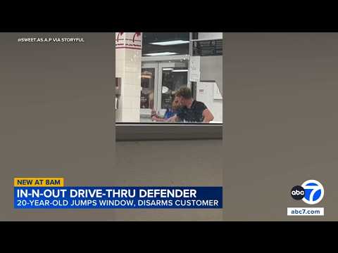 Man jumps through In-N-Out drive-thru window to stop armed woman