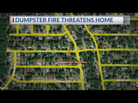 Dumpster fire threatens home