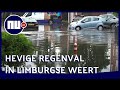 Ondergelopen straten in Weert na hevige regenval | NU.nl