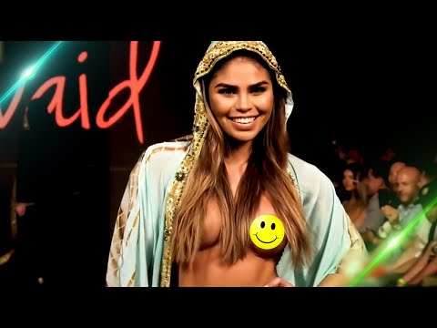 Naked fashion show. Sexy models on the catwalk ...