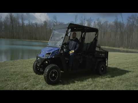 Landmaster AMP Crew Touring Electric UTV – Loading & Hauling Wood with Ease