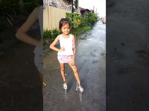 Little Girl Walking in High Heels - Stan Twitter