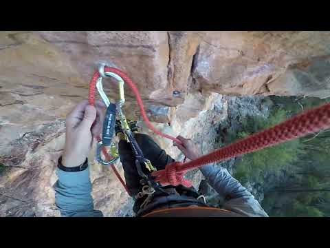 Cleaning overhanging routes using lower out