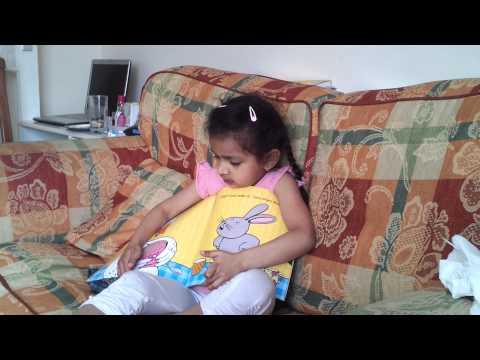 Pranati reading "Chocolate Moose for greedy goose"