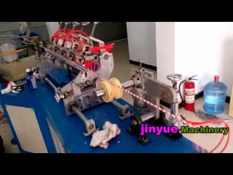 Working of paper drinking straw making machine