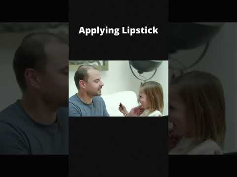 Daughter Applying Lipstick on Her Father