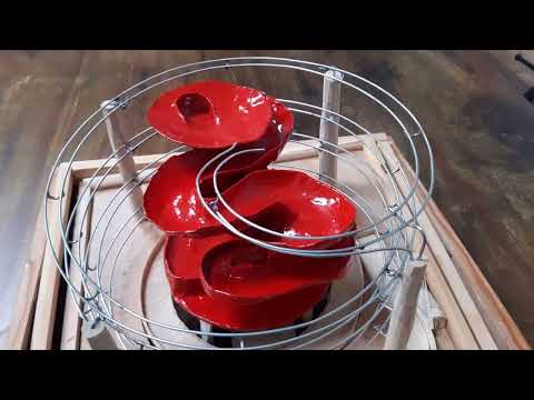 Marble machine No. 3: tilting helix lifter