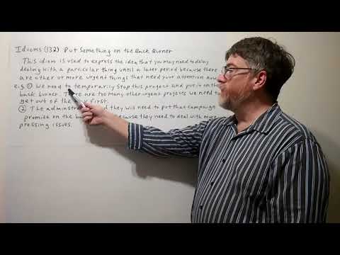 Tutor Nick P Idioms (132) Put Something on the Back Burner