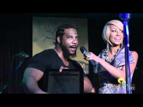 Pre-Grammy Party, Polow Da Don gets an award from Keri Hilson