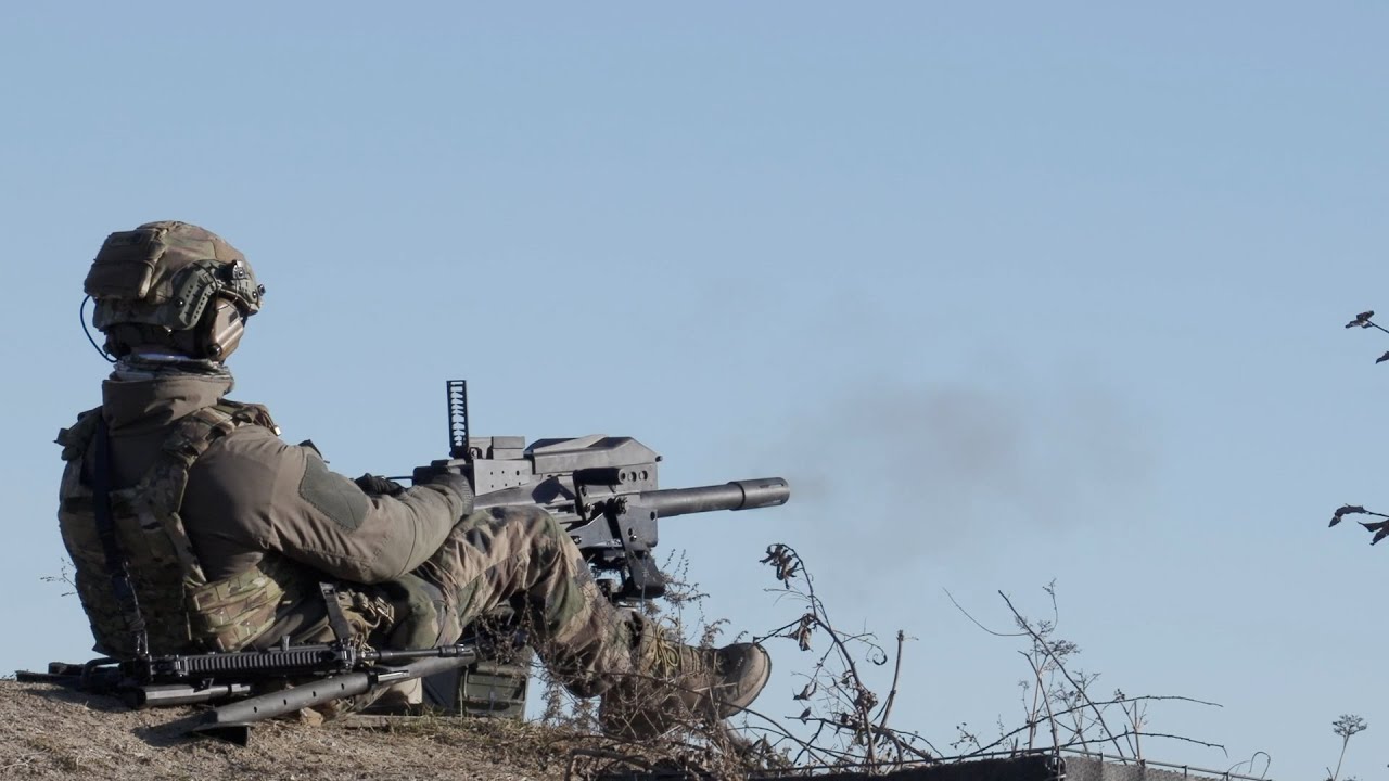 French chief fries Russian invaders with an American grenade launcher
