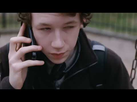 Louder Than Bombs trailer shot of Gene and Conrad walking beside a field