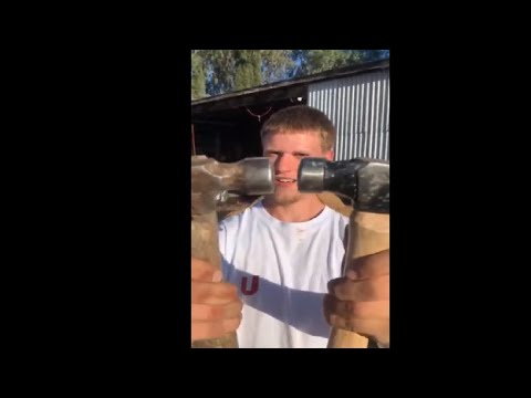 Banging Hammers Heads Against Each Other