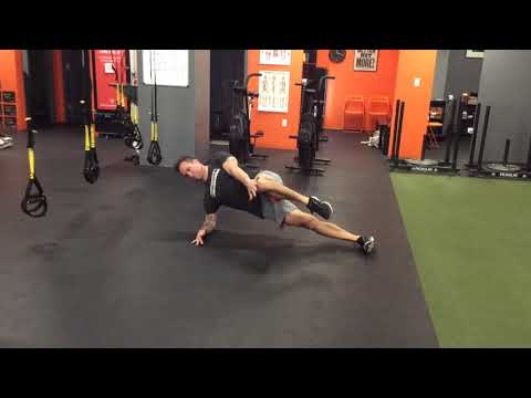 Side Plank with Ipsilateral Hand to Knee Taps