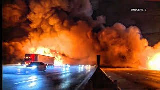 Massive Fire Engulfs Pallet Yard and 10 Freeway in Los Angeles