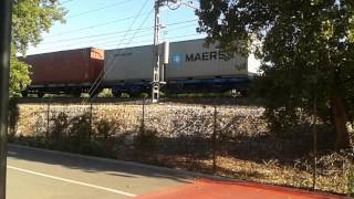 preview picture of video 'Freight train between Barcelona and Tarragona passing Las Palmeras'
