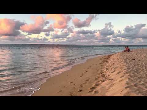 Sunset at Ha‘ena Beach in Kauai. Kauai sunsets are one of the latest in 24 hour world time zones.