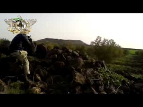 اشتباكات بين عناصر لواء توحيد الأمة وقوات النظام اثناء اقتحام تل غرين في ريف درعا