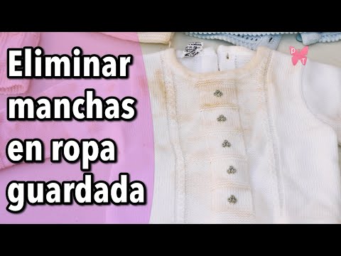 Lavar ropa con manchas amarillas por el guardado