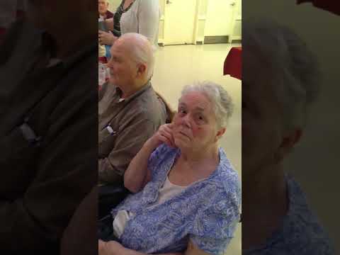 Mary Jo playing piano for mom and dad