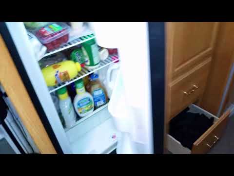 RV Repair: Norcold refrigerator door hinge broken off repair.