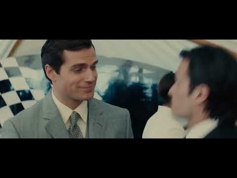 The Man from U.N.C.L.E. 2015 trailer frame with Napoleon Solo and Illya Kuryakin in a 1960s European street